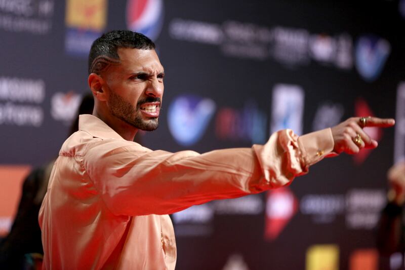 Egyptian actor Hassan Abouelrouss on the red carpet. Photo: El Gouna Film Festival; AFP