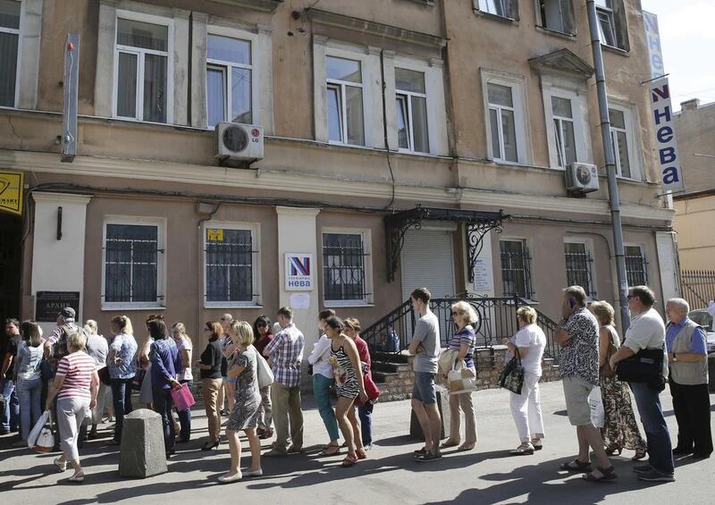 Clients queue outside the office of tour operator Neva as they attempt to get back their money for paid vacation packages. Neva, one of the five Russian tour operators which closed shop recently, had the greatest number of tie-ups with agencies abroad, including in the UAE. Reuters