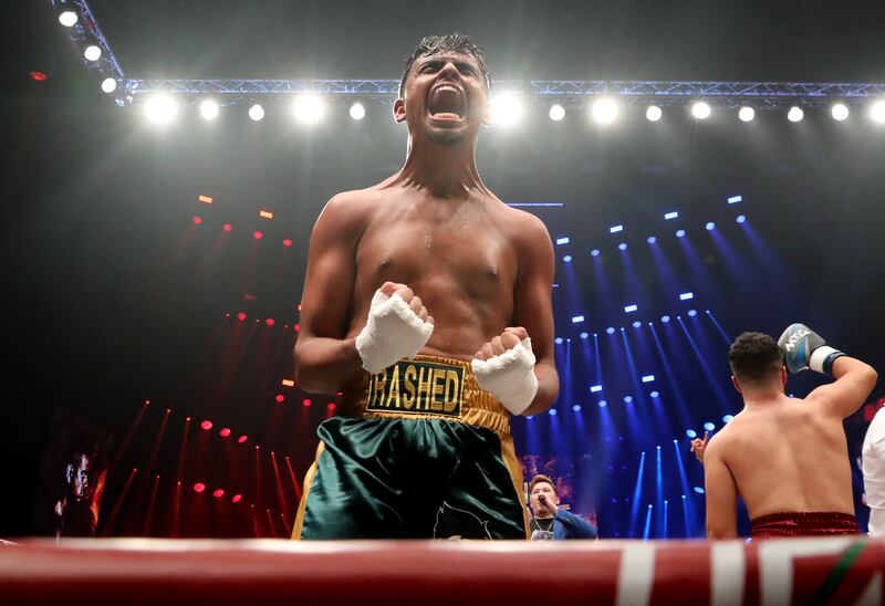 Annas Elshayib (blue gloves) takes on Money Kicks (red gloves) at the Social Knockout at the Coca-Cola Arena in Dubai.