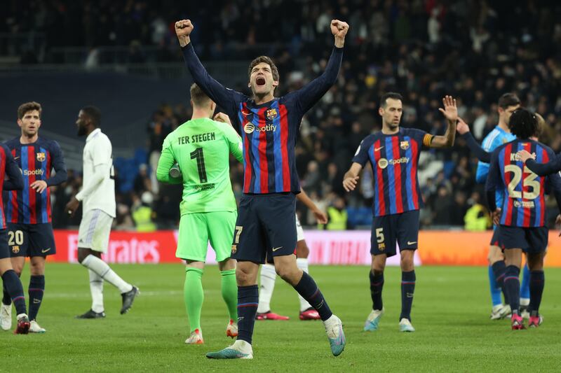 Marcos Alonso 7 - Challenged by Vinicius but held up well in the face of waves of Madrid attacks as Barça won the first of three derbies in a month. EPA