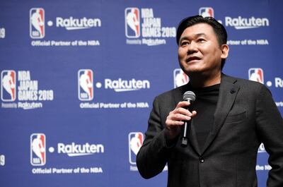 Japanese internet company Rakuten President and CEO Hiroshi Mikitani announces NBA Japan Games 2019 during a press conference in Tokyo Tuesday, March 5, 2019. Mikitani announced that the NBA's Toronto Raptors and Houston Rockets will play on Oct. 8 and Oct. 10 at the Saitama Super Arena this year. (AP Photo/Eugene Hoshiko)