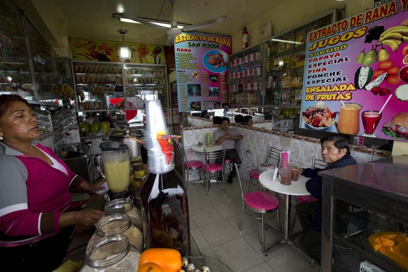 The juice is a greenish colour and Ms Cruz serves it in glasses to her customers.