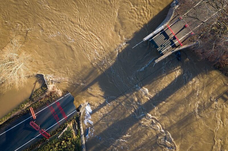 The historic Llanerch Bridge between Trefnant and Tremeirchion which has collapsed due to the floodwaters of Storm Christoph in St Asaph. Getty Images