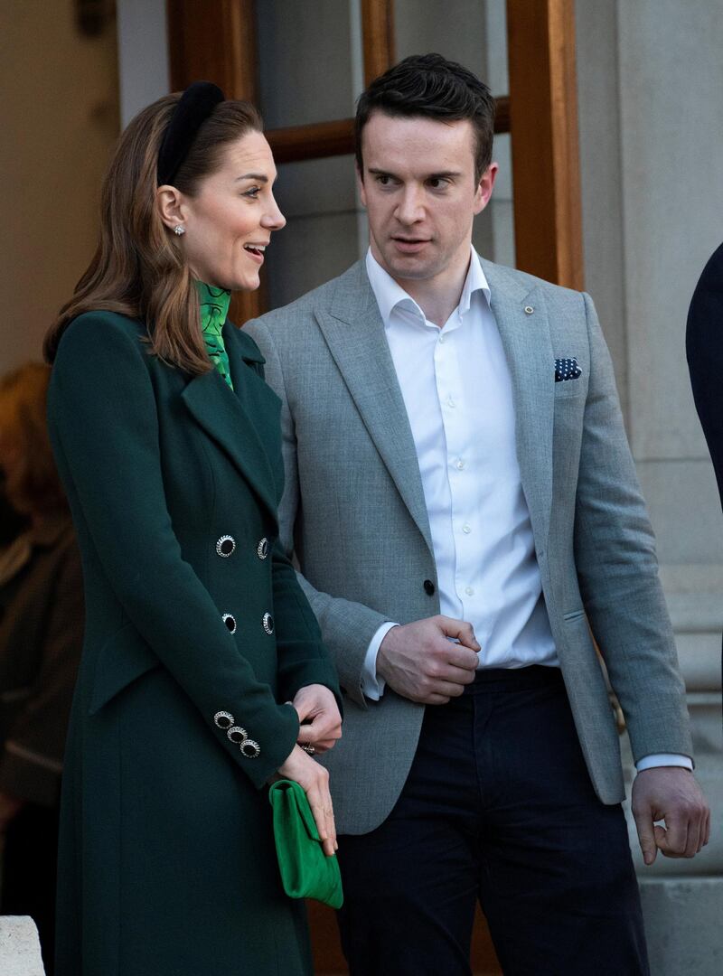 Catherine, Duchess of Cambridge speaks to Matthew Barrett at Government Buildings in Dublin. Reuters