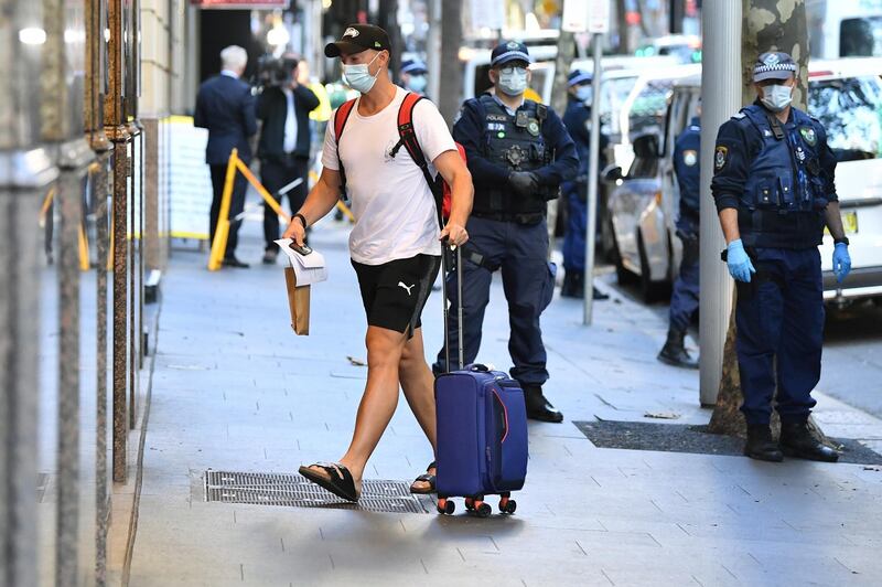 Daniel Sams arrives for hotel quarantine at the Marriott Hotel in Sydney on Monday. EPA