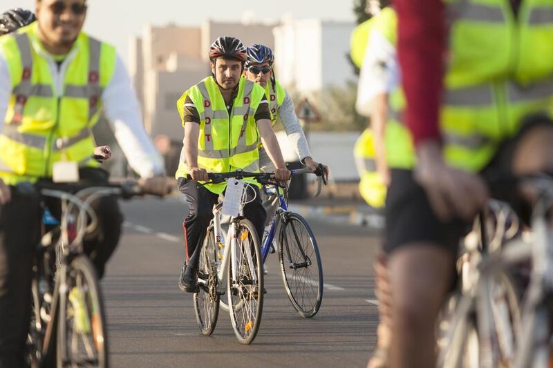 Department of Transport employees cycle to work. Antonie Robertson / The National