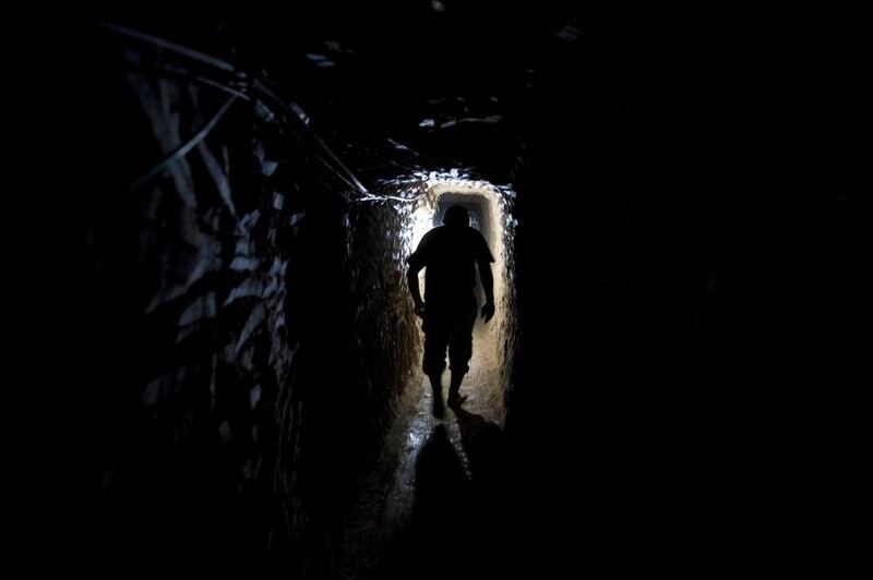 A Palestinian smuggler in a tunnel in the Rafah refugee camp, in the southern Gaza Strip, on the border with Egypt on January 25, 2009. Heide Levine for The National