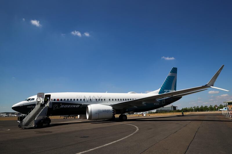 A Boeing Co. 737 Max 7 jetliner sits on the tarmac during preparations ahead of the Farnborough International Airshow (FIA) 2018 in Farnborough, U.K., on Sunday, July 15, 2018. The air show, a biannual showcase for the aviation industry, runs until July 22. Photographer: Simon Dawson/Bloomberg