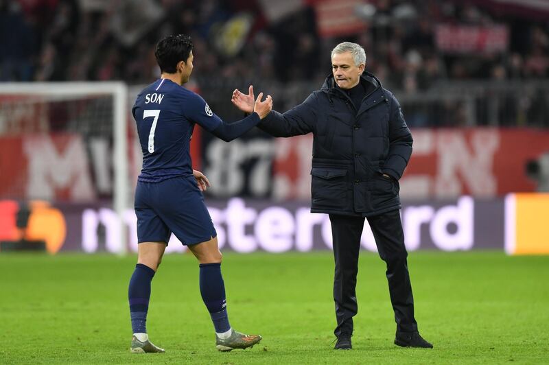 Tottenham Hotspur manager Jose Mourinho with Son Heung-min after the defeat to Bayern Munich. AFP