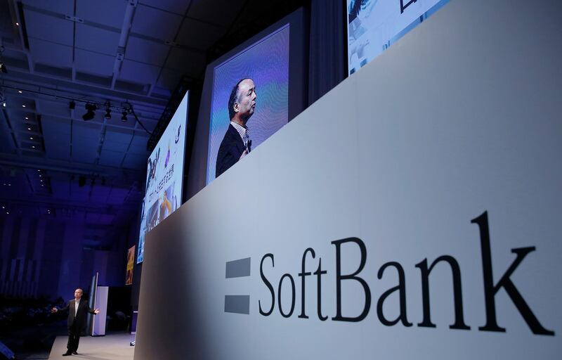 FILE- In this July 20, 2017, file photo, SoftBank Group Corp. Chief Executive Officer Masayoshi Son speaks during a SoftBank World presentation at a hotel in Tokyo. Japanese internet and energy company SoftBank Group Corp. is reporting Wednesday, Feb. 7, 2018, a more than 11-fold surge in profit for the fiscal third quarter thanks to strong sales and to improved results from U.S. carrier Sprint. (AP Photo/Shizuo Kambayashi, File)
