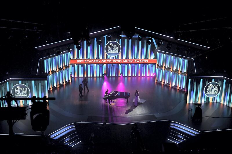 NASHVILLE, TENNESSEE - SEPTEMBER 16: (L-R) Keith Urban and Mickey Guyton perform onstage during the 55th Academy of Country Music Awards at the Grand Ole Opry on September 16, 2020 in Nashville, Tennessee. The ACM Awards airs on September 16, 2020 with some live and some prerecorded segments.   Jason Kempin/Getty Images for ACM/AFP