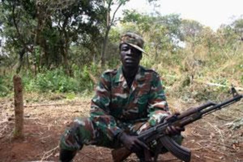A Lord's Resistance Army soldier poses during peace talks between his commanders ans Ugandan religious and cultural leaders in southern Sudan.