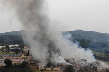 Smoke billows from a fire following an explosion at a fireworks factory outside the Turkish town of Hendek in Sakarya province on July 3, 2020. IHA via AP