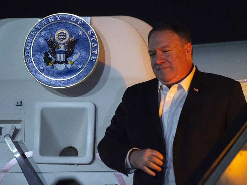 US Secretary of State Mike Pompeo arrives at the Cairo International Airport in the Egyptian capital on January 9, 2019.  The eight-day tour comes weeks after the US President announced that the United States would quickly pull its 2,000 soldiers out of Syria, declaring that IS -- also known as ISIS -- had been defeated. / AFP / POOL / ANDREW CABALLERO-REYNOLDS
