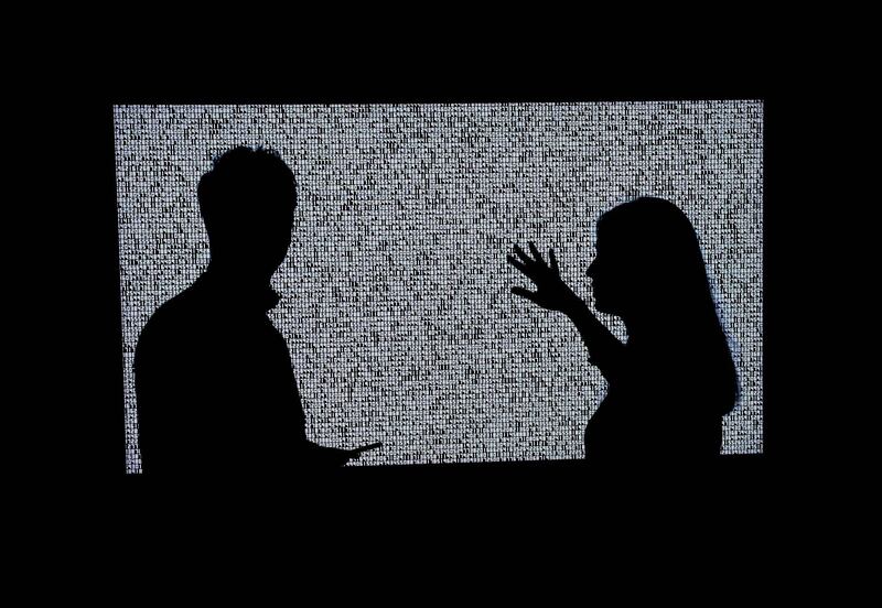 A woman looks at a NFT by Ryoji Ikeda titled "A Single Number That Has 10,000,086 Digits" during a media preview on June 4, 2021, at Sotheby's for the Natively Digital: A Curated NFT Sale Online Auction to take place June 10, 2021 RESTRICTED TO EDITORIAL USE - MANDATORY MENTION OF THE ARTIST UPON PUBLICATION - TO ILLUSTRATE THE EVENT AS SPECIFIED IN THE CAPTION
 / AFP / TIMOTHY A. CLARY / RESTRICTED TO EDITORIAL USE - MANDATORY MENTION OF THE ARTIST UPON PUBLICATION - TO ILLUSTRATE THE EVENT AS SPECIFIED IN THE CAPTION
