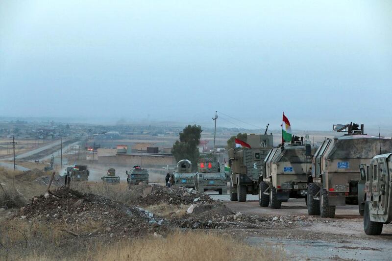 Kurdish peshmerga forces begin their advance towards the ISIL-held town of Bashiqa near the village of Narawan in northern Iraq on October 20, 2016. Florian Neuhof for The National