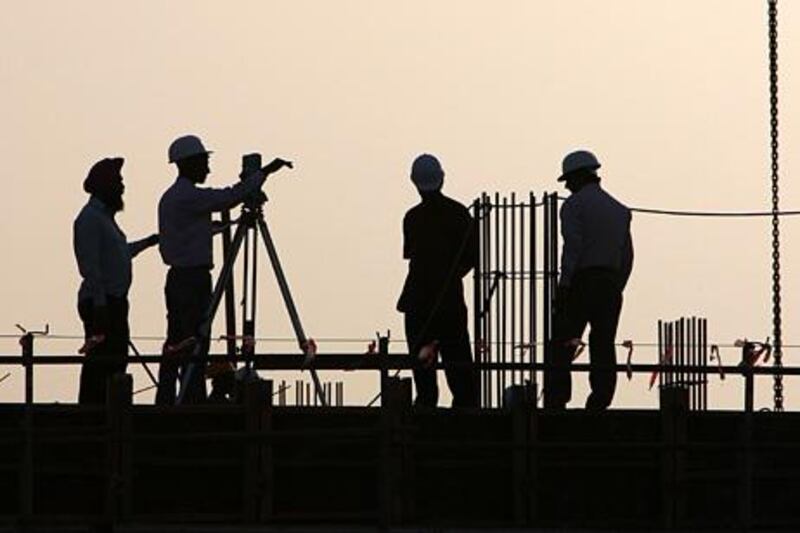 (GENERIC CAPTION, ONLY MENTION THAT THE PHOTO WAS TAKEN IN THE EMIRATES - NOT DUBAI)
DUBAI , UNITED ARAB EMIRATES  –  Jan 14 : Construction going on at one of the site in Al Manara area on Sheikh Zayed road in Dubai. ( Pawan Singh / The National ) For Business stock