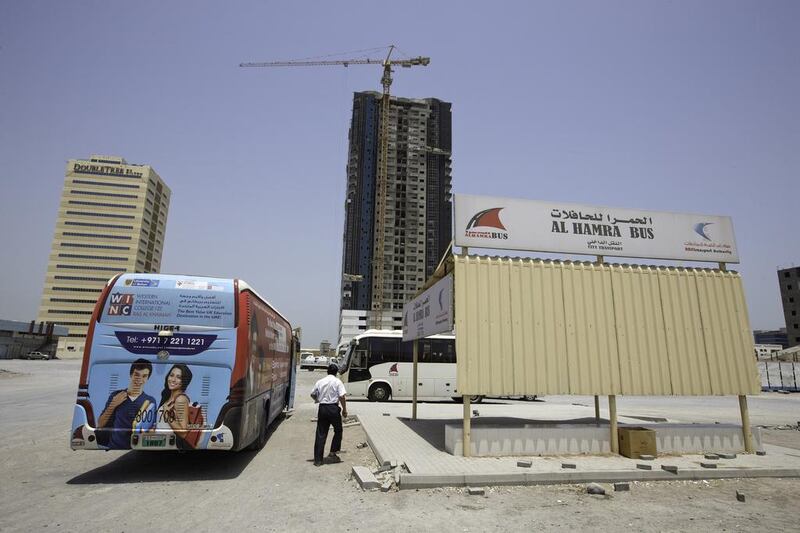 The bus station at Al Hamra. Commuters say there are no timetables or facilities, and that the services are erratic. Many say stations are so few they have to catch a cab to get to them. Jaime Puebla / The National  