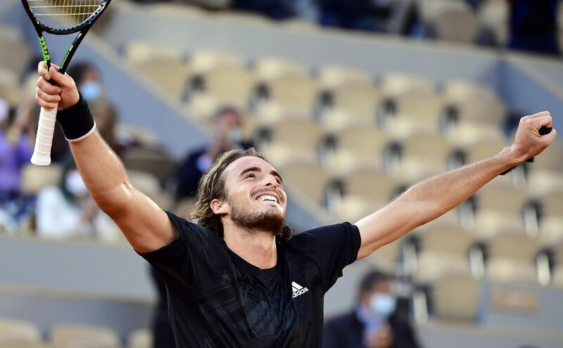 epa08727036 Stefanos Tsitsipas of Greece reacts after winning against Andrey Rublev of Russia in their men’s quarter final match during the French Open tennis tournament at Roland ​Garros in Paris, France, 07 October 2020.  EPA/JULIEN DE ROSA