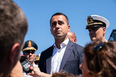 Luigi Di Maio, Italy's deputy prime minister, speaks to the media as he visits the Morandi motorway bridge after it partially collapsed in Genoa, Italy, on Wednesday, Aug. 15, 2018. The Italian government called on managers at Atlantia Spa's highway-operator unit to resign following the collapse of the bridge that killed at least 37 people. Photographer: Federico Bernini/Bloomberg