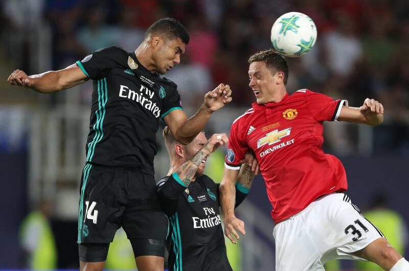 Manchester United's Nemanja Matic and Real Madrid's Casemiro battle for the ball. Nick Potts / PA