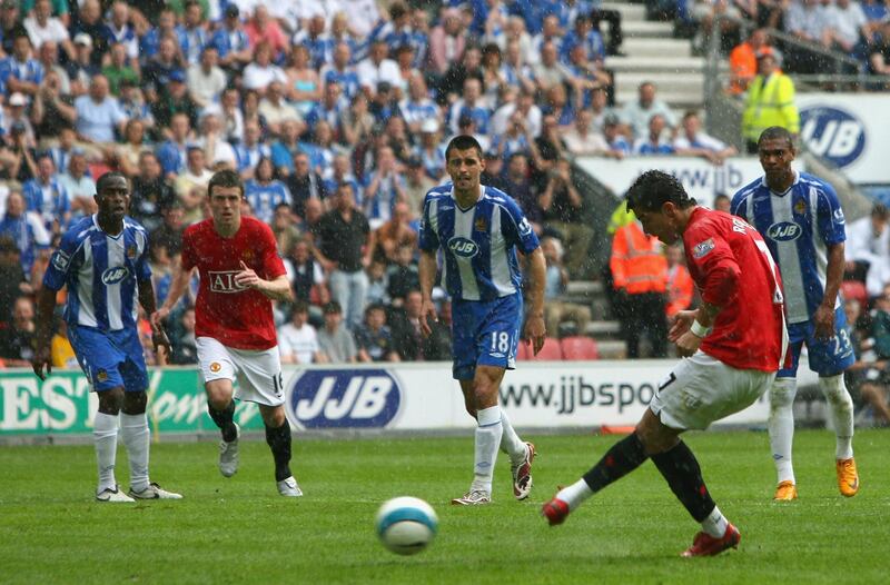 WIGAN, UNITED KINGDOM - MAY 11:   Cristiano Ronaldo of Manchester United scores the opening goal from the penalty spot during the Barclays Premier League match between Wigan Athletic and Manchester United at The JJB Stadium on May 11, 2008 in Wigan, England. (Photo by Alex Livesey/Getty Images)