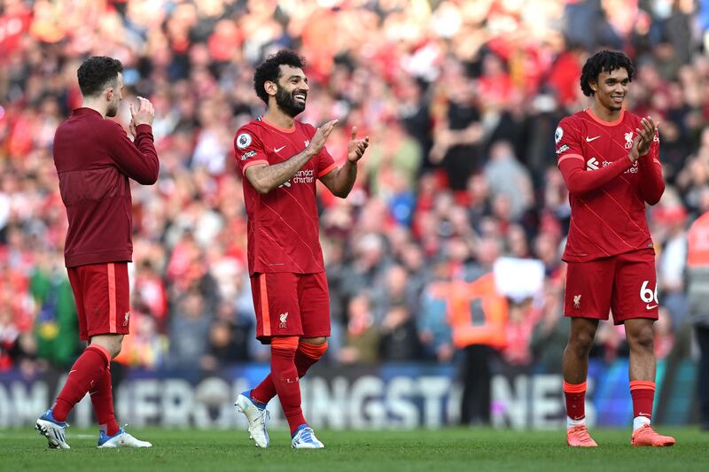 Liverpool's Diogo Jota, Mohamed Salah and Trent Alexander-Arnold applaud the fans. AFP