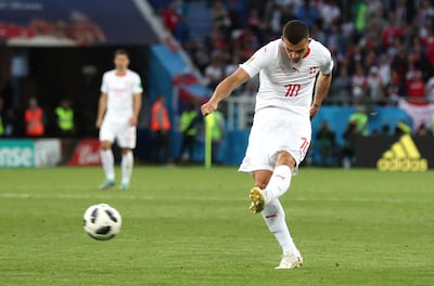 KALININGRAD, RUSSIA - JUNE 22:  Granit Xhaka of Switzerland scores his team's first goal during the 2018 FIFA World Cup Russia group E match between Serbia and Switzerland at Kaliningrad Stadium on June 22, 2018 in Kaliningrad, Russia.  (Photo by Clive Rose/Getty Images)