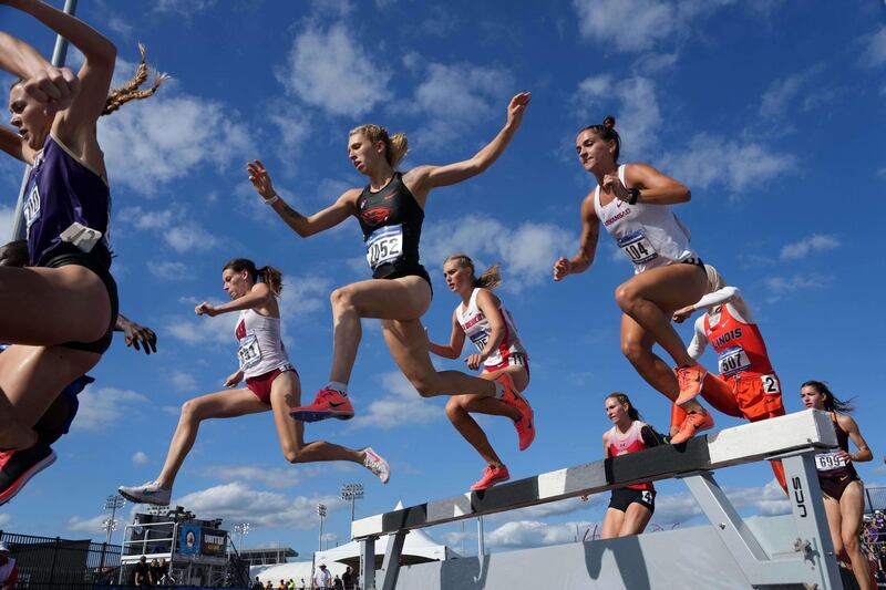 Athletes compete in the women's steeplechase during the NCAA West Preliminary at E.B. Cushing Stadium in Texas. Reuters