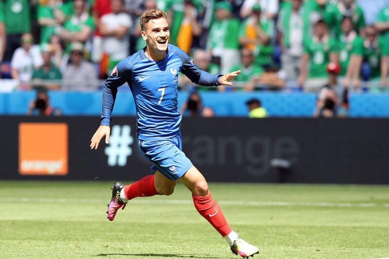 Antoine Griezmann celebrates scoring the equalising goal. Valery Hache / AFP
