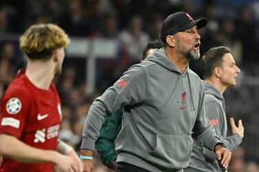 Liverpool's German coach Jurgen Klopp reacts during the UEFA Champions League last 16 second leg football match between Real Madrid CF and Liverpool FC at the Santiago Bernabeu stadium in Madrid on March 15, 2023.  (Photo by JAVIER SORIANO  /  AFP)