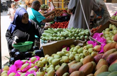 Shoppers at an outdoor food market in Cairo. EPA