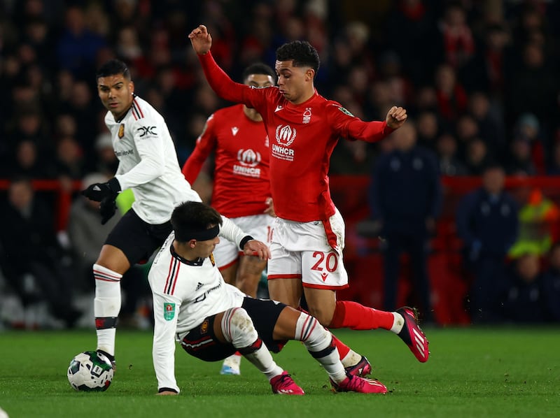 Lisandro Martinez - 8 Convincing on a challenging night where Johnson’s pace tested the entire United defence. Beautiful ball forward on 59 towards Fernandes. Touched the ball 118 times – no other player had more than 89 touches. Blocked, intercepted, tackled. 

Reuters