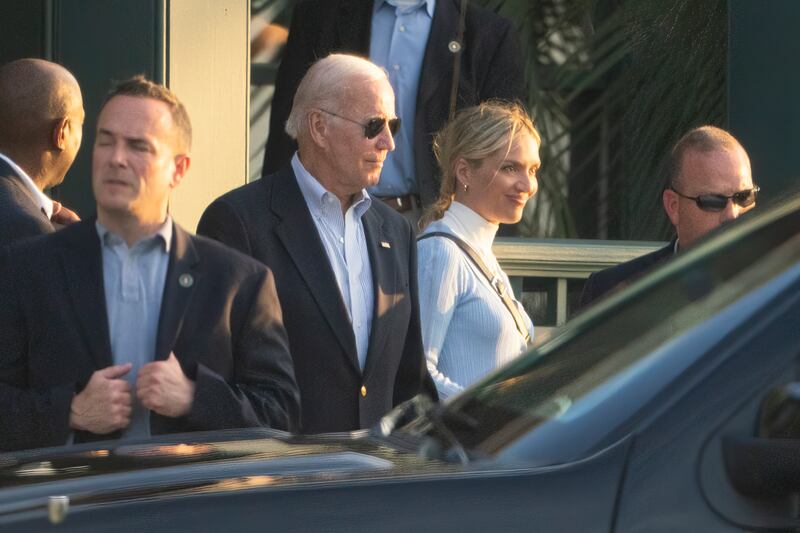 Mr Biden with daughter-in-law Melissa Cohen leaving the Kiawah Island Beach Club at Kiawah Island, South Carolina. AP
