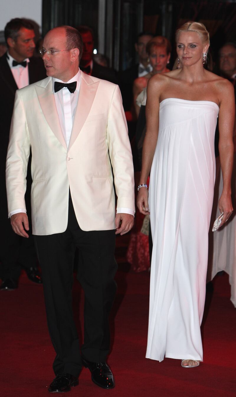 Prince Albert II of Monaco and Charlene Wittstock, in a white strapless dress, attend the Red Cross Ball in Monte Carlo on July 27, 2007. Getty Images