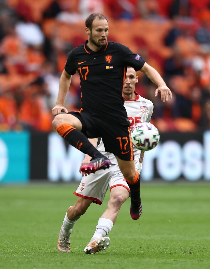 Daley Blind - 8: Older and more experienced head always organising and always asking for the ball on the left of the back three. Made the interception from the even older Pandev which started the counter and led to the opening goal. Reuters
