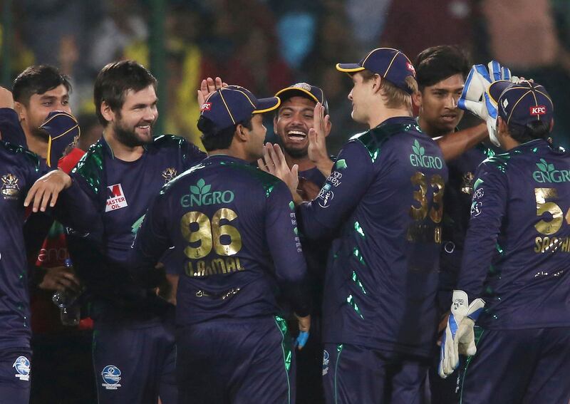 Quetta Gladiators' players celebrate their victory against Peshawar Zalmi in the Pakistan Super League playoff at National Stadium in Karachi, Pakistan, Wednesday, March 13, 2019. Quetta Gladiators won by 10 runs against Peshawar Zalmi. (AP Photo/Fareed Khan)