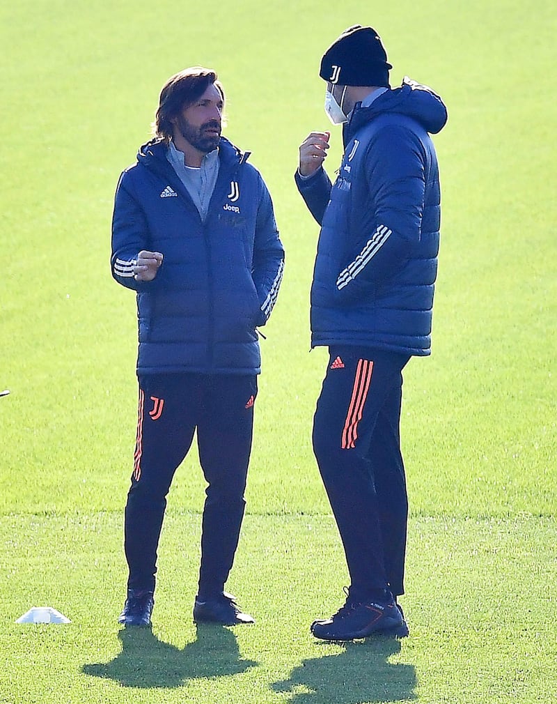 Juventus manager Andrea Pirlo and his assistant Igor Tudor oversee the training session in Turin. EPA