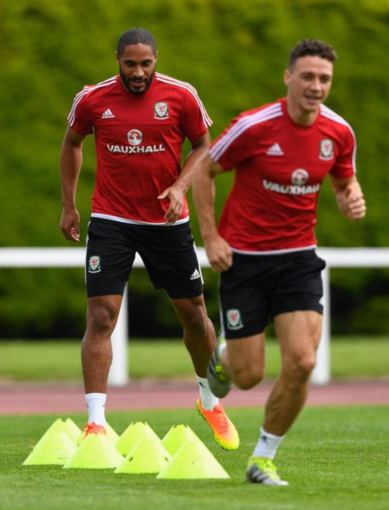 Wales players Ashley Williams (l) and James Chester in action during Wales training ahead of their UEFA Euro 2016 semi final against Portugal at College Le Bocage on July 4, 2016 in Dinard, France.  (Photo by Stu Forster/Getty Images)