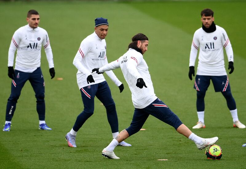 Paris Saint-Germain's midfielder Marco Verratti, forward Kylian Mbappe, defenders Sergio Ramos and Juan Bernat train. AFP