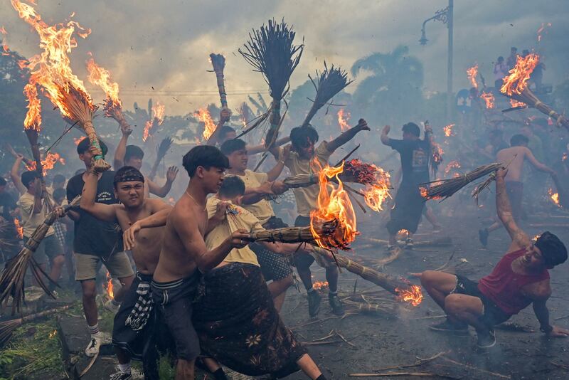 Hindus take part in Perang Api, a tradition believed to cleanse evil elements and keep misfortune at bay, ahead of Nyepi, a day of silent self-reflection, in Mataram, Lombok, Indonesia. Reuters