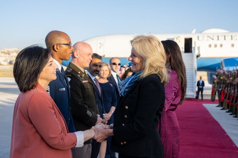US first lady Jill Biden is greeted by International Women of Courage Award winner Hadeel Aziz on arrival in Amman. Photo: Twitter @FLOTUS