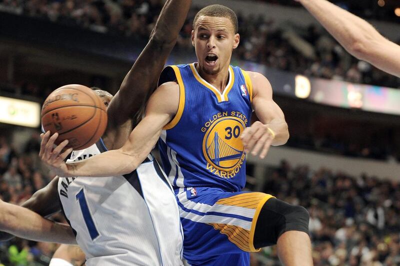 Stephen Curry is averaging 24.1 points per game for Golden State this season. Matt Strasen / AP