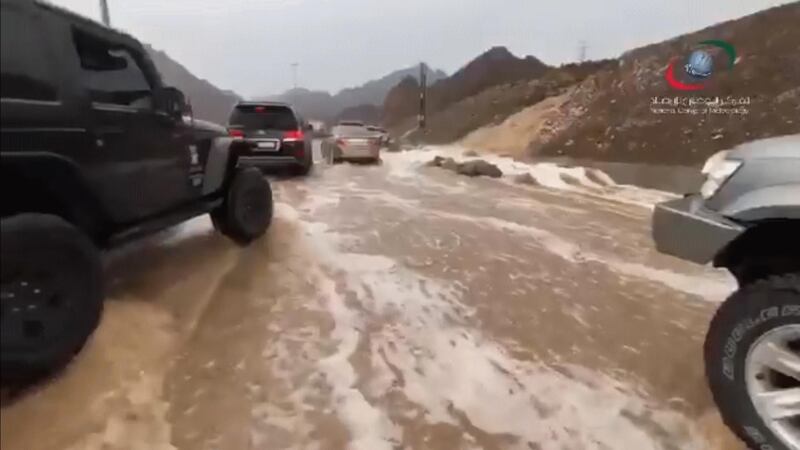 Motorists drive carefully over a flooded road to Kalba in Sharjah. Courtesy: National Centre of Meteorology