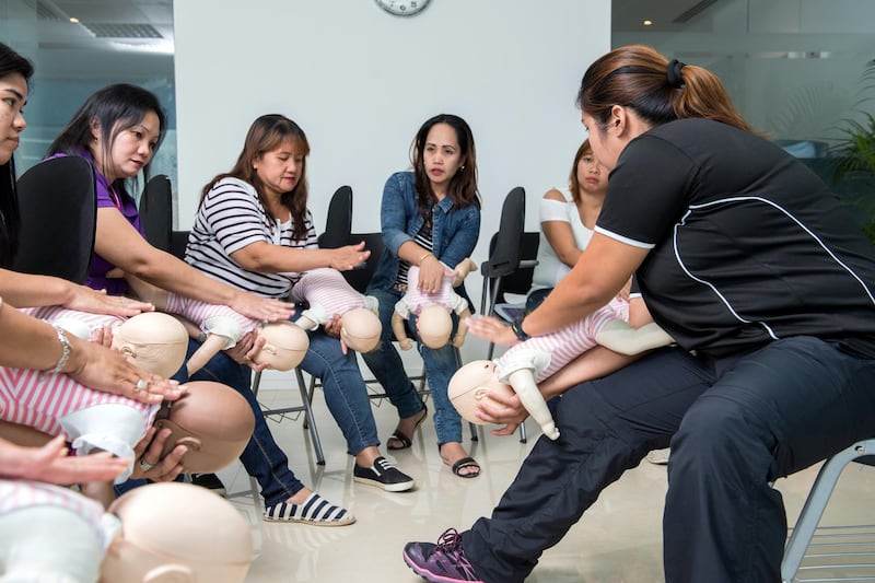 Nannies at Cloudnine Kids in Dubai being trained up in first aid skills. Courtesy of Angelica Robinson