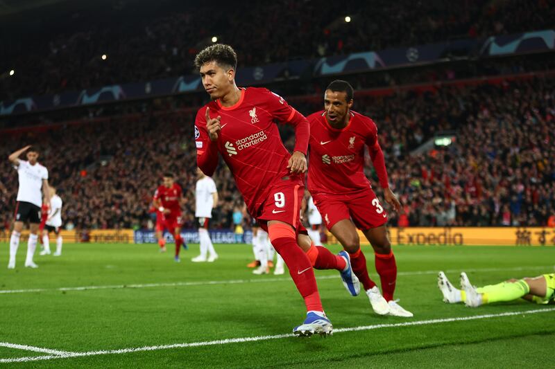 Liverpool's Roberto Firmino celebrates the third goal. Getty