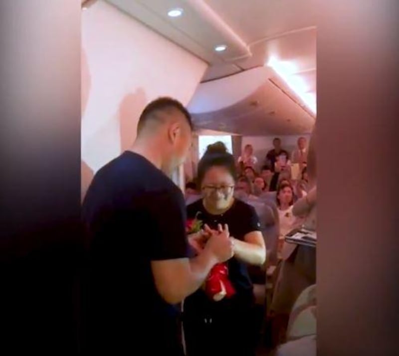 The groom-to-be proposes on an Emirates flight on Chinese Valentine's Day  