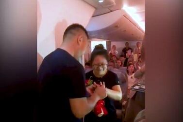 The groom-to-be proposes on an Emirates flight on Chinese Valentine's Day  
