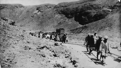 Men build a single track railway through the Valley of Kings to transport cases of relics from Tutankhamun's tomb in Luxor in 1923.  Getty Images