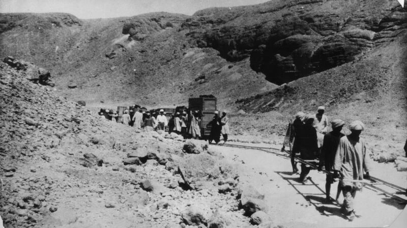 Workers build a single-track railway through the Valley of the Kings for transporting relics from Luxor, in 1923.